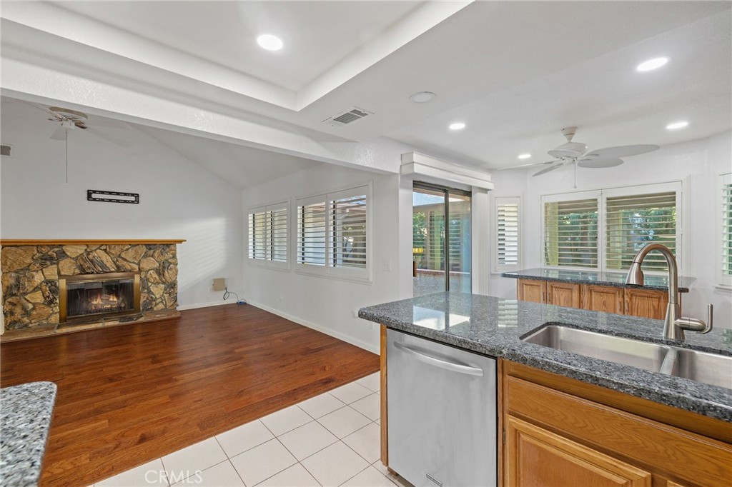11030 Vicksburg Court Rancho Cucamonga, CA 91737 - Photo 22 of 53 a kitchen with granite countertop sink and granite counter tops