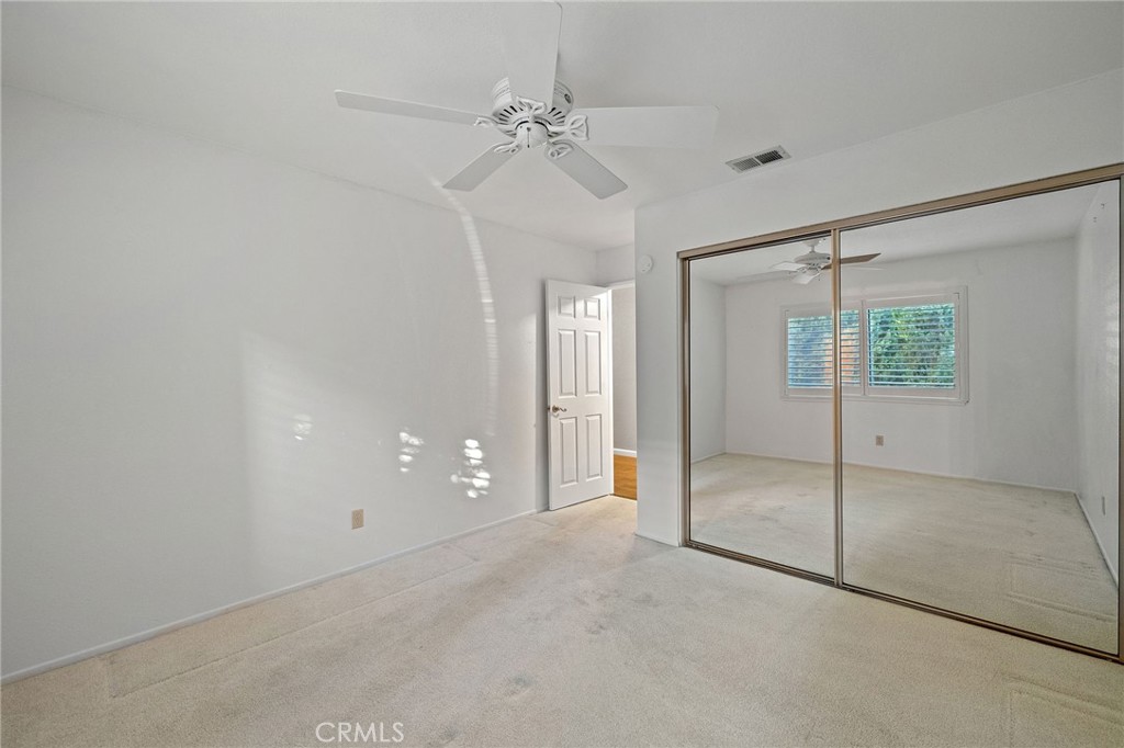 11030 Vicksburg Court Rancho Cucamonga, CA 91737 - Photo 30 of 53 an empty room with a glass door and shower