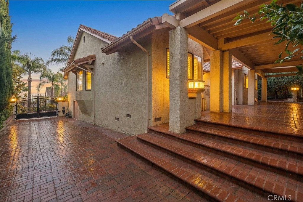 11030 Vicksburg Court Rancho Cucamonga, CA 91737 - Photo 42 of 53 a view of a house with a yard