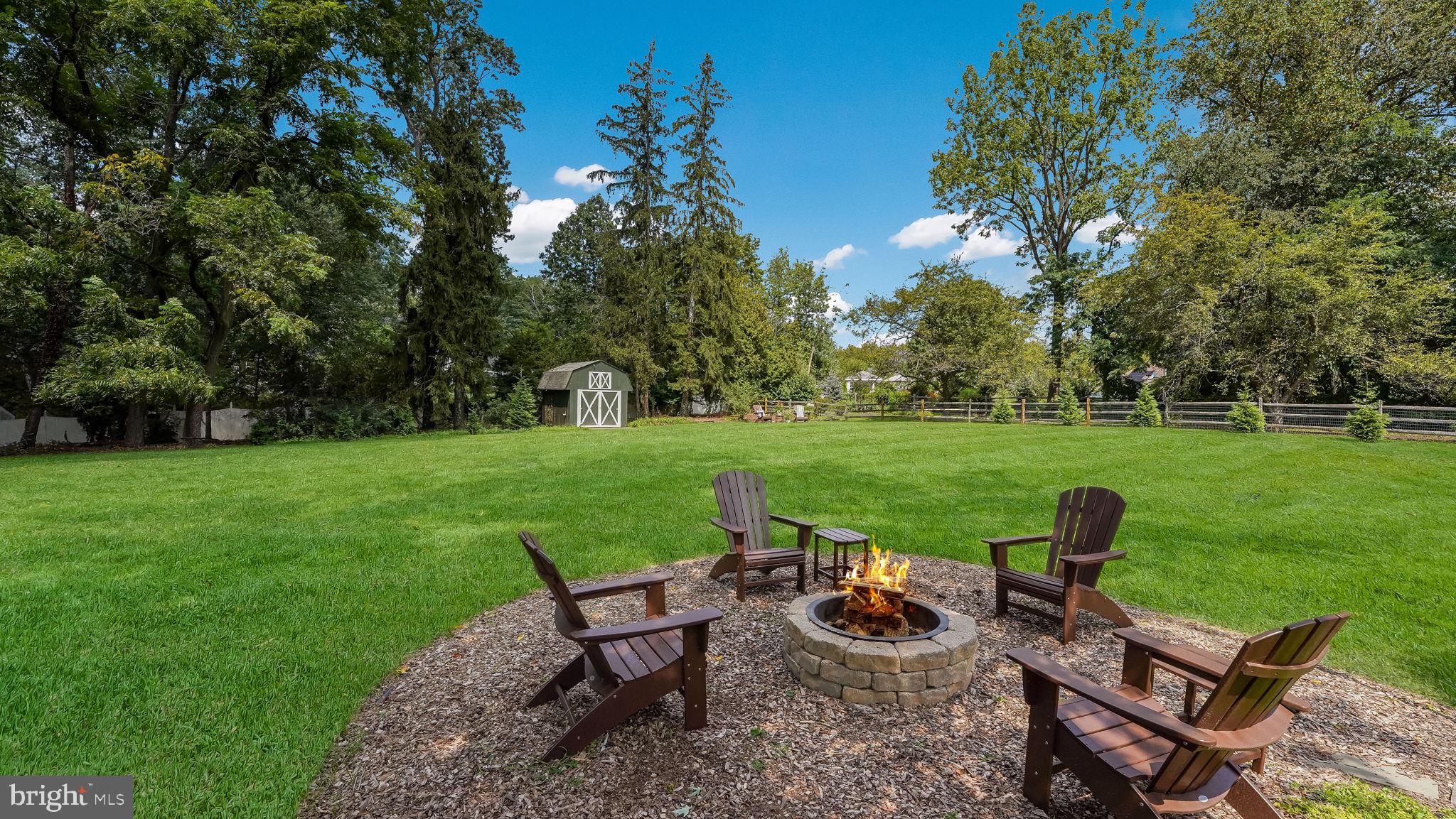 722 Spring Valley Road Doylestown, PA 18901 - Photo 39 of 45 View Across Firepit Area towards shed & lawn.