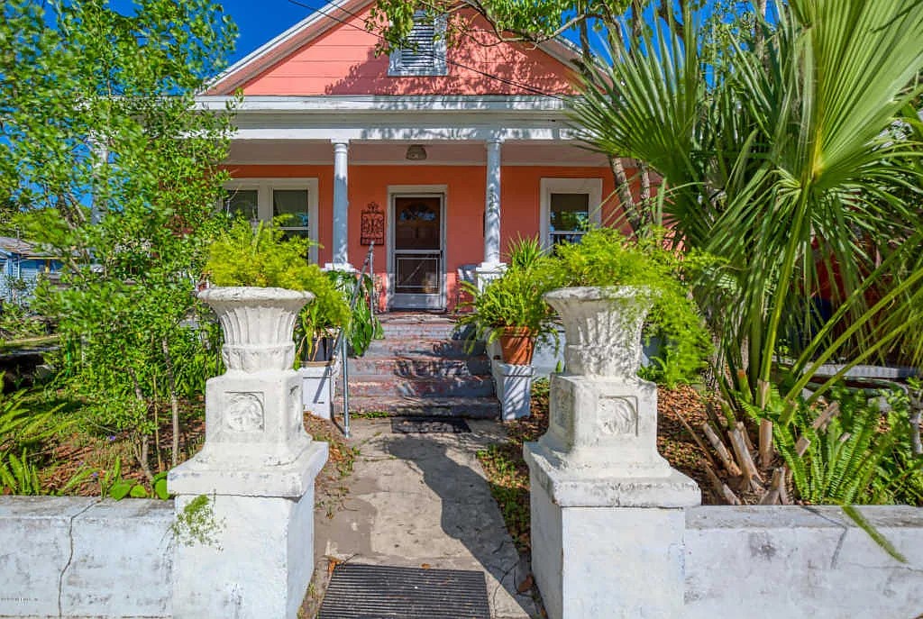 324 South 9th Street Fernandina Beach, FL 32034 - Photo 1 of 4 front view of a house with potted plants