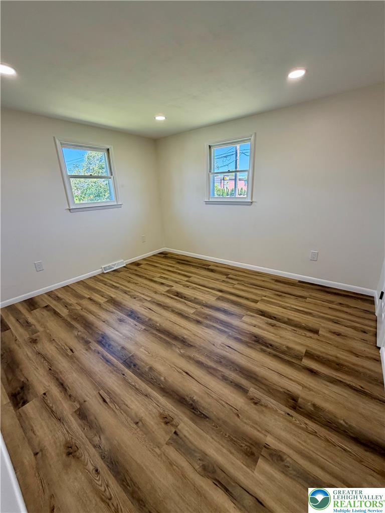 3508 Nazareth Road Easton, PA 18045 - Photo 19 of 25 Good size main bedroom new flooring and dimmable recessed lighting define this inviting, naturally illuminated bedroom.
