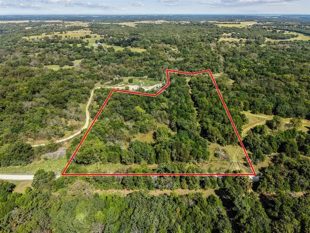 a view of a yard with an outdoor space