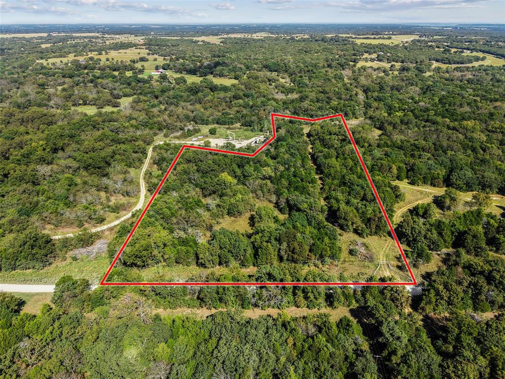 a view of a yard with an outdoor space