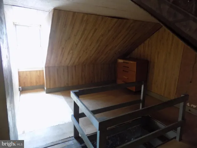 a kitchen with a table and chairs