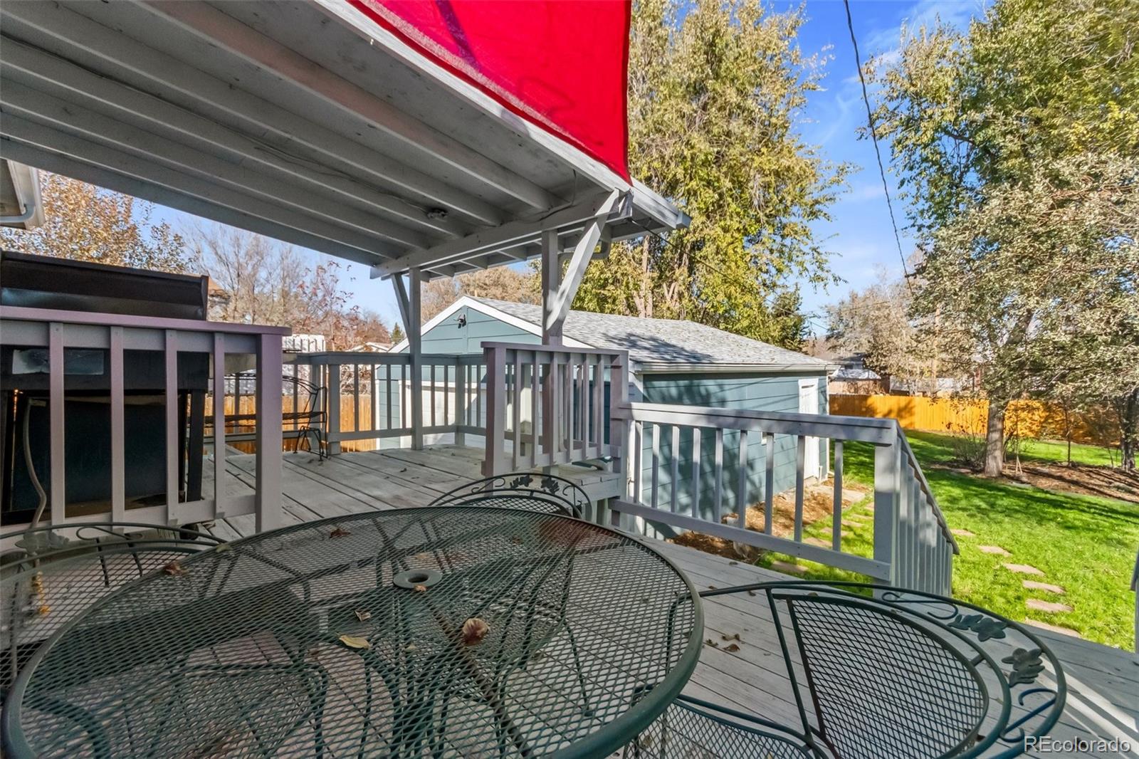 13436 Fitzsimons Way Aurora, CO 80011 - Photo 39 of 40 a view of deck with patio