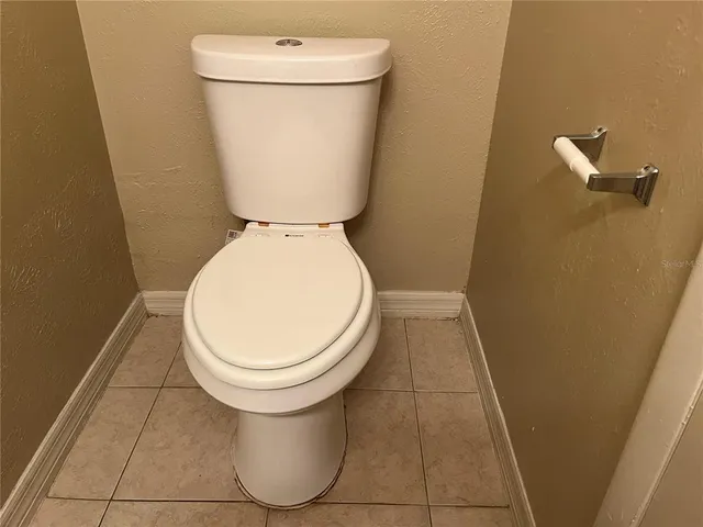 a close view of a toilet in a bathroom