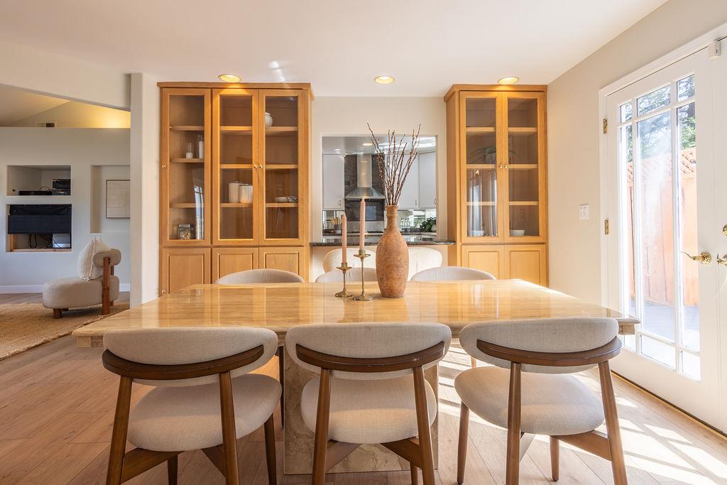 3455 Dover Road Redwood City, CA 94061 - Photo 11 of 39 a view of a dining room with furniture and wooden floor