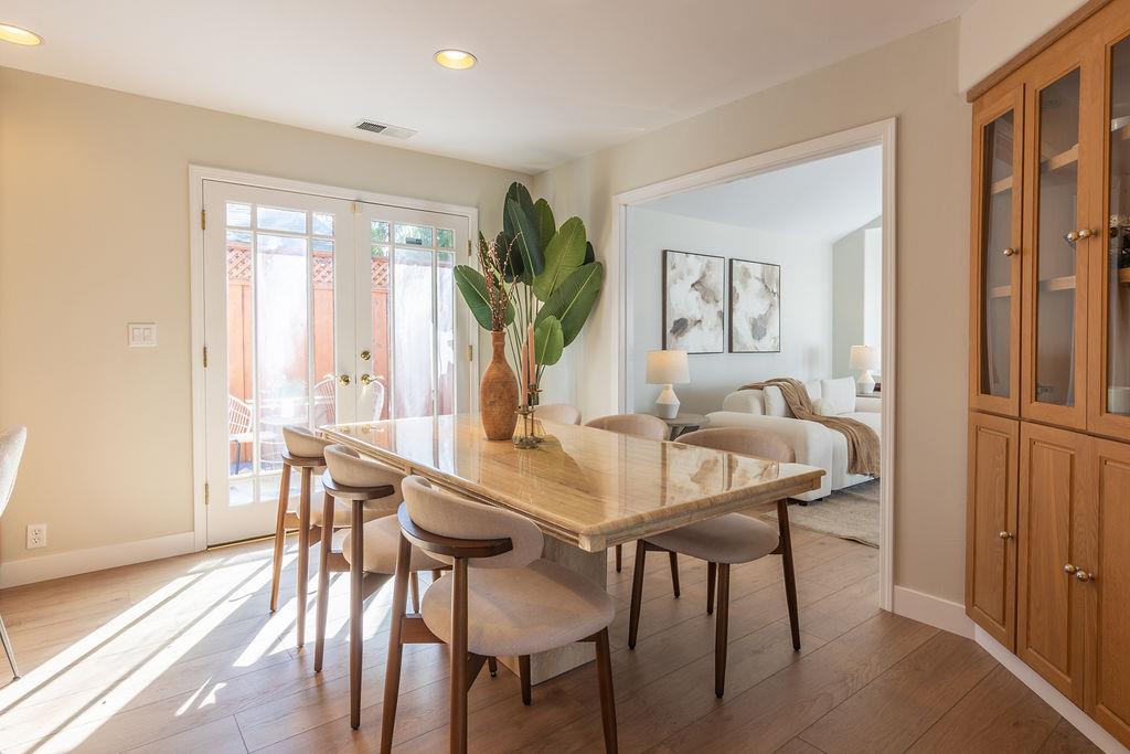 3455 Dover Road Redwood City, CA 94061 - Photo 13 of 39 a view of a dining room with furniture window and wooden floor