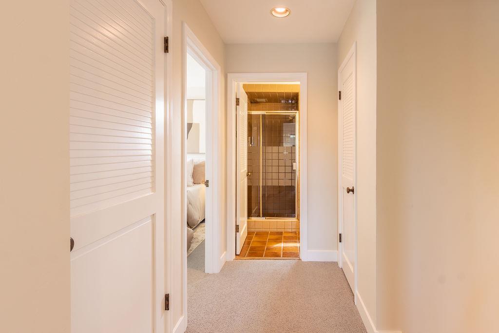 3455 Dover Road Redwood City, CA 94061 - Photo 17 of 39 a view of a bathroom with a shower and closet