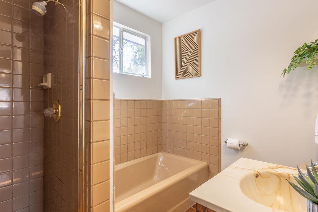 3455 Dover Road Redwood City, CA 94061 - Photo 27 of 39 a bathroom with a sink and a bathtub