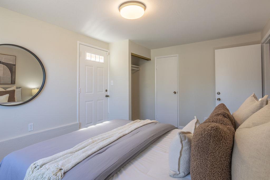 3455 Dover Road Redwood City, CA 94061 - Photo 30 of 39 a bedroom with a bed and a mirror