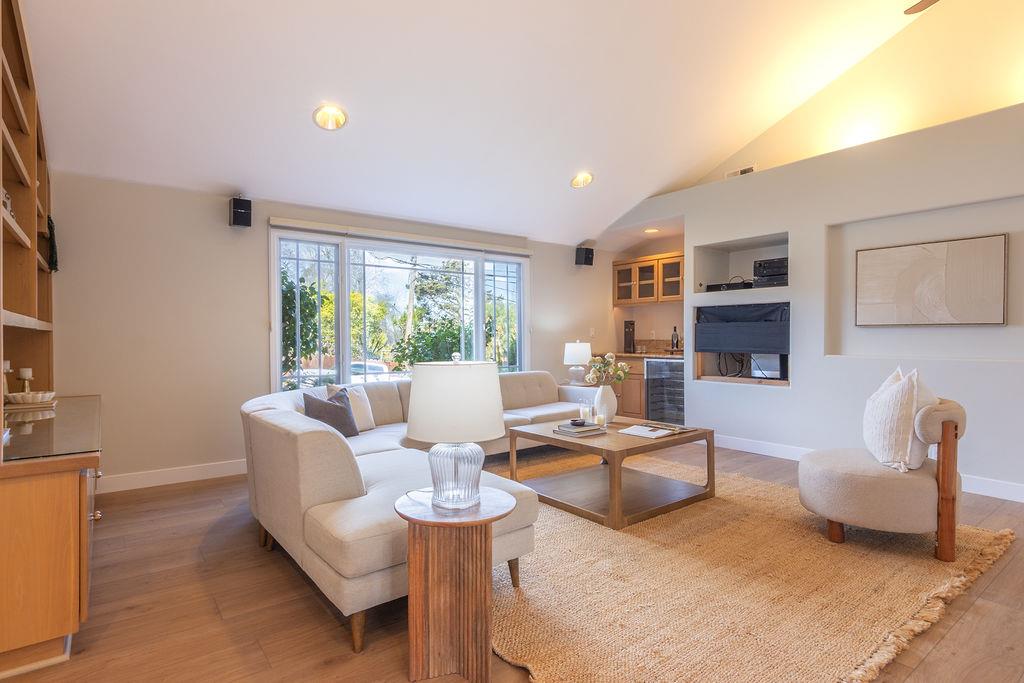 3455 Dover Road Redwood City, CA 94061 - Photo 5 of 39 a living room with fireplace furniture and a large window