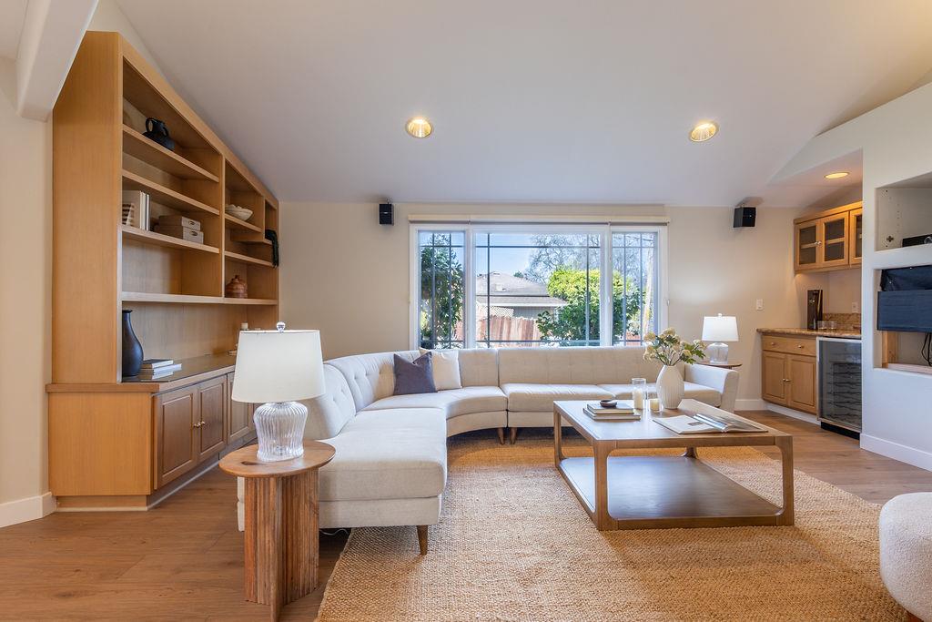 3455 Dover Road Redwood City, CA 94061 - Photo 6 of 39 a living room with furniture wooden floor and a large window