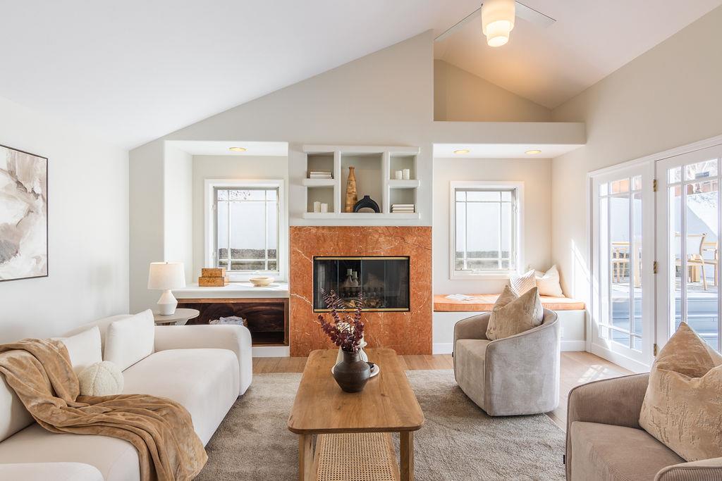 3455 Dover Road Redwood City, CA 94061 - Photo 9 of 39 a living room with furniture fireplace and a large window