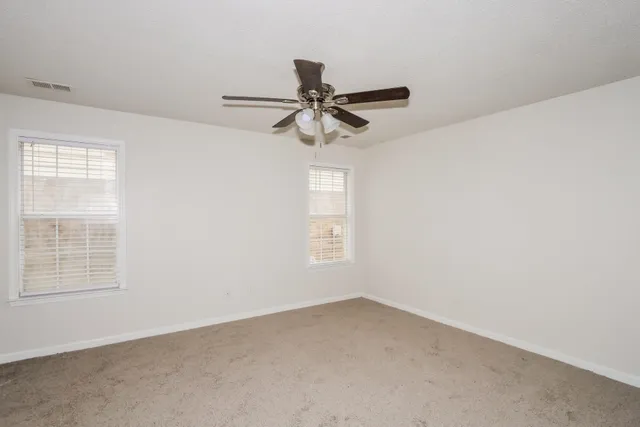 a view of a window in an empty room