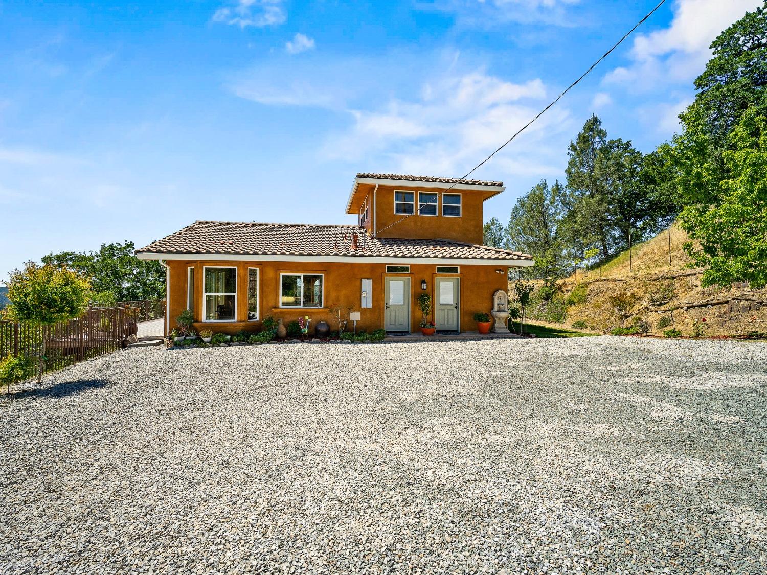 6801 Sagittarius Road Placerville, CA 95667 - Photo 12 of 34 a front view of a house with a yard