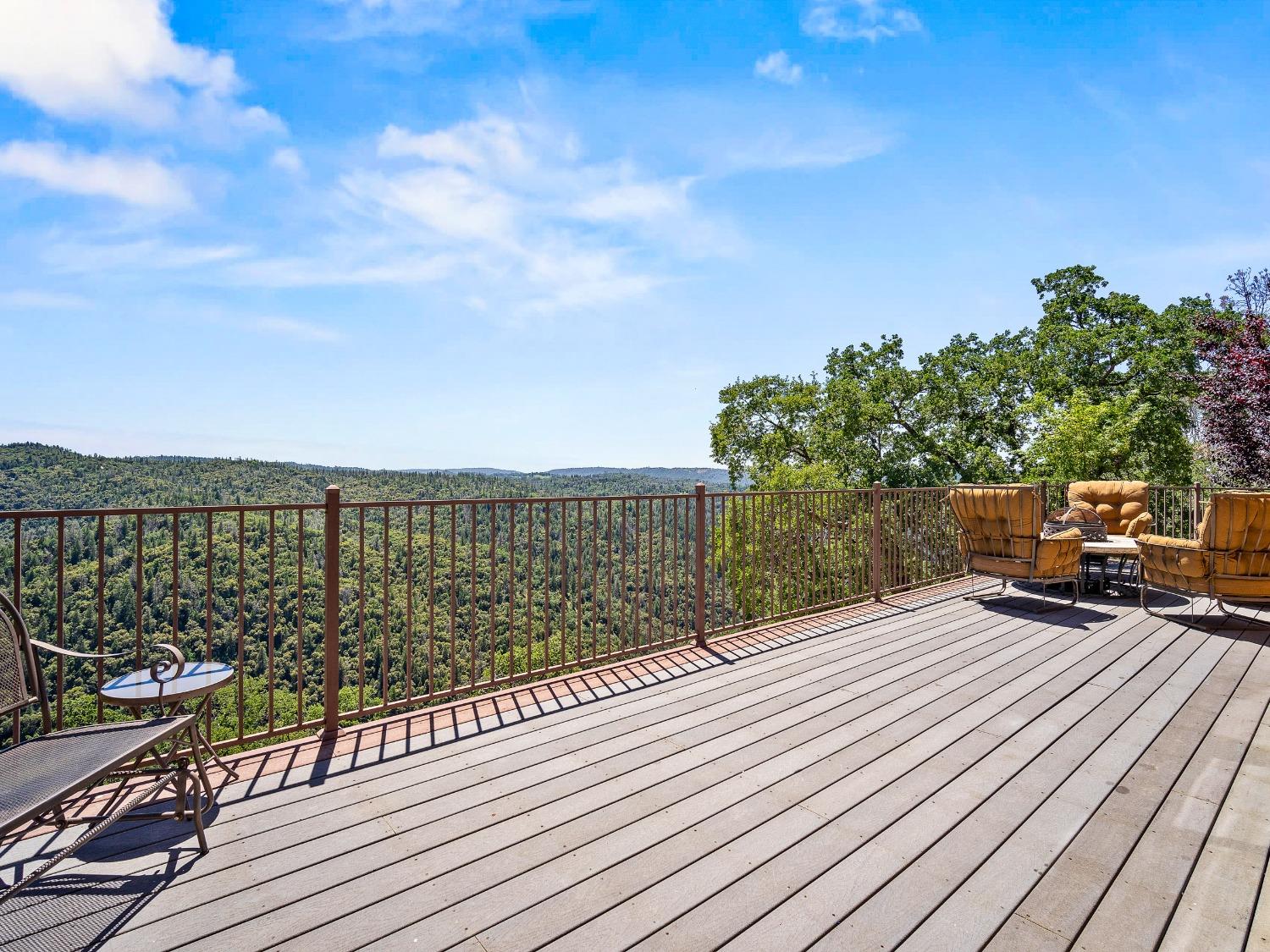 6801 Sagittarius Road Placerville, CA 95667 - Photo 13 of 34 a view of a balcony with wooden floor space and city view