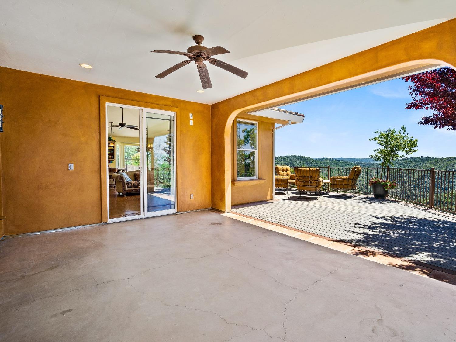 6801 Sagittarius Road Placerville, CA 95667 - Photo 15 of 34 a view of a livingroom with a ceiling fan and window