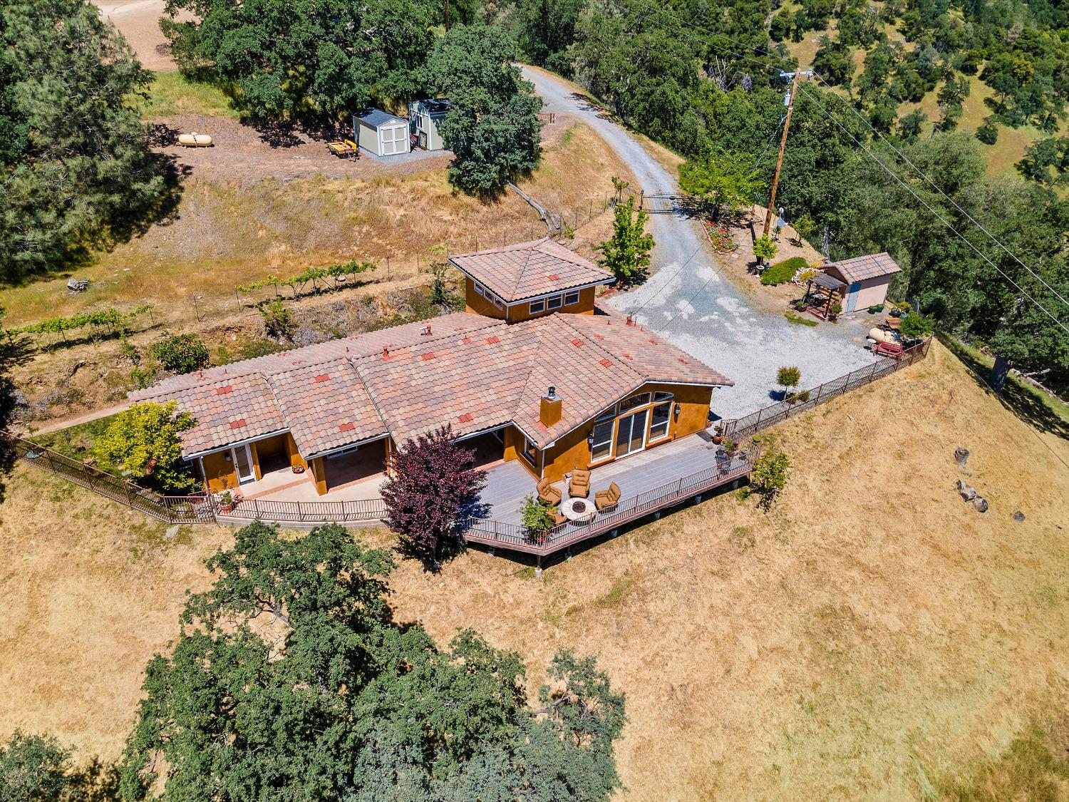 6801 Sagittarius Road Placerville, CA 95667 - Photo 19 of 34 an aerial view of a house with swimming pool and large trees