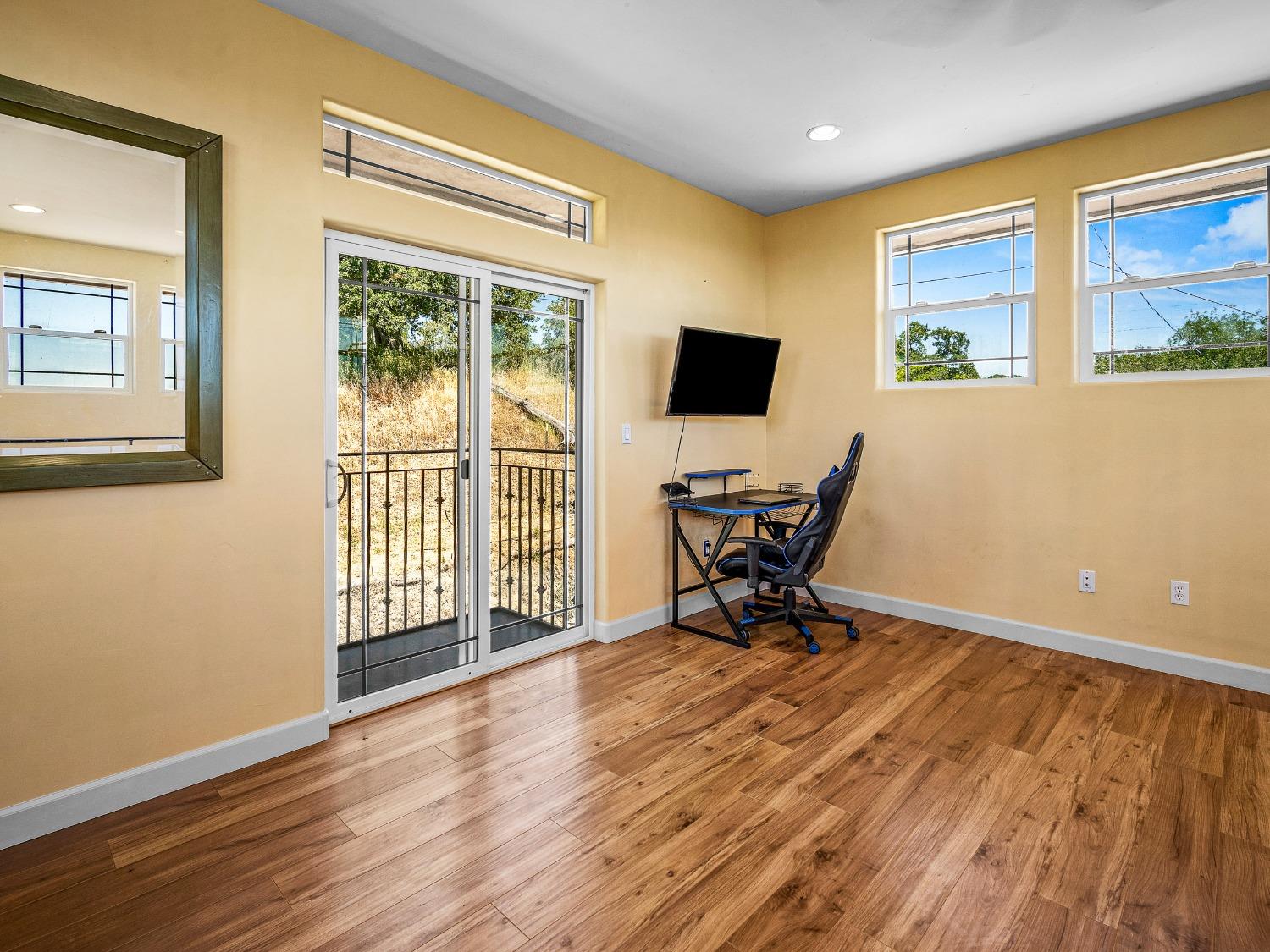 6801 Sagittarius Road Placerville, CA 95667 - Photo 34 of 34 a view of a workspace with wooden floor and a window