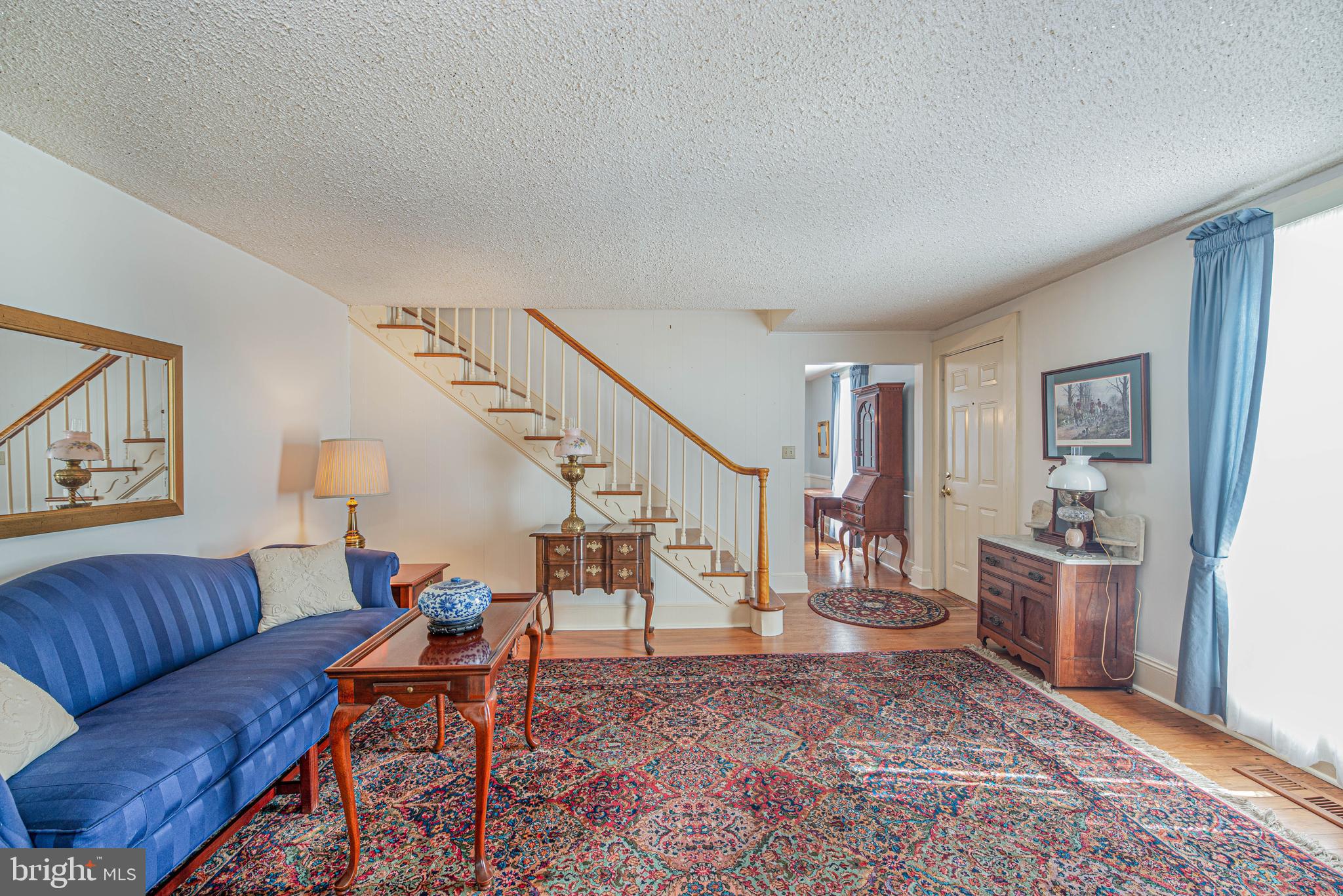 41 Lighthouse Road Selbyville, DE 19975 - Photo 5 of 35 Family room with hardwood floors