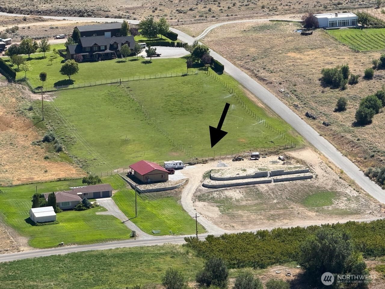 a view of swimming pool with a yard and outdoor seating