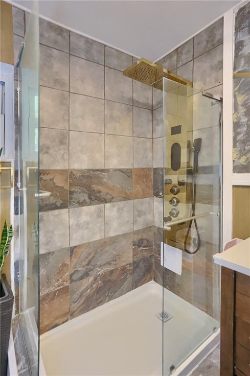 5848 Saltsburg Road Verona, PA 15147 - Photo 17 of 23 a bathroom with a bathtub and a shower