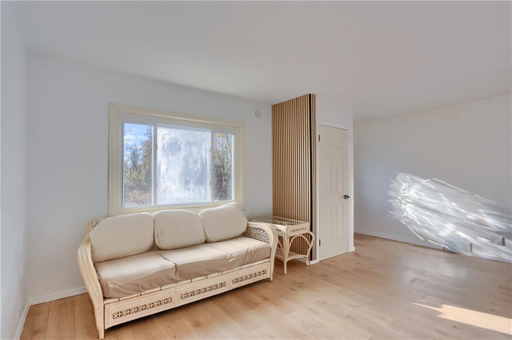 5848 Saltsburg Road Verona, PA 15147 - Photo 5 of 23 a living room with furniture and a large window