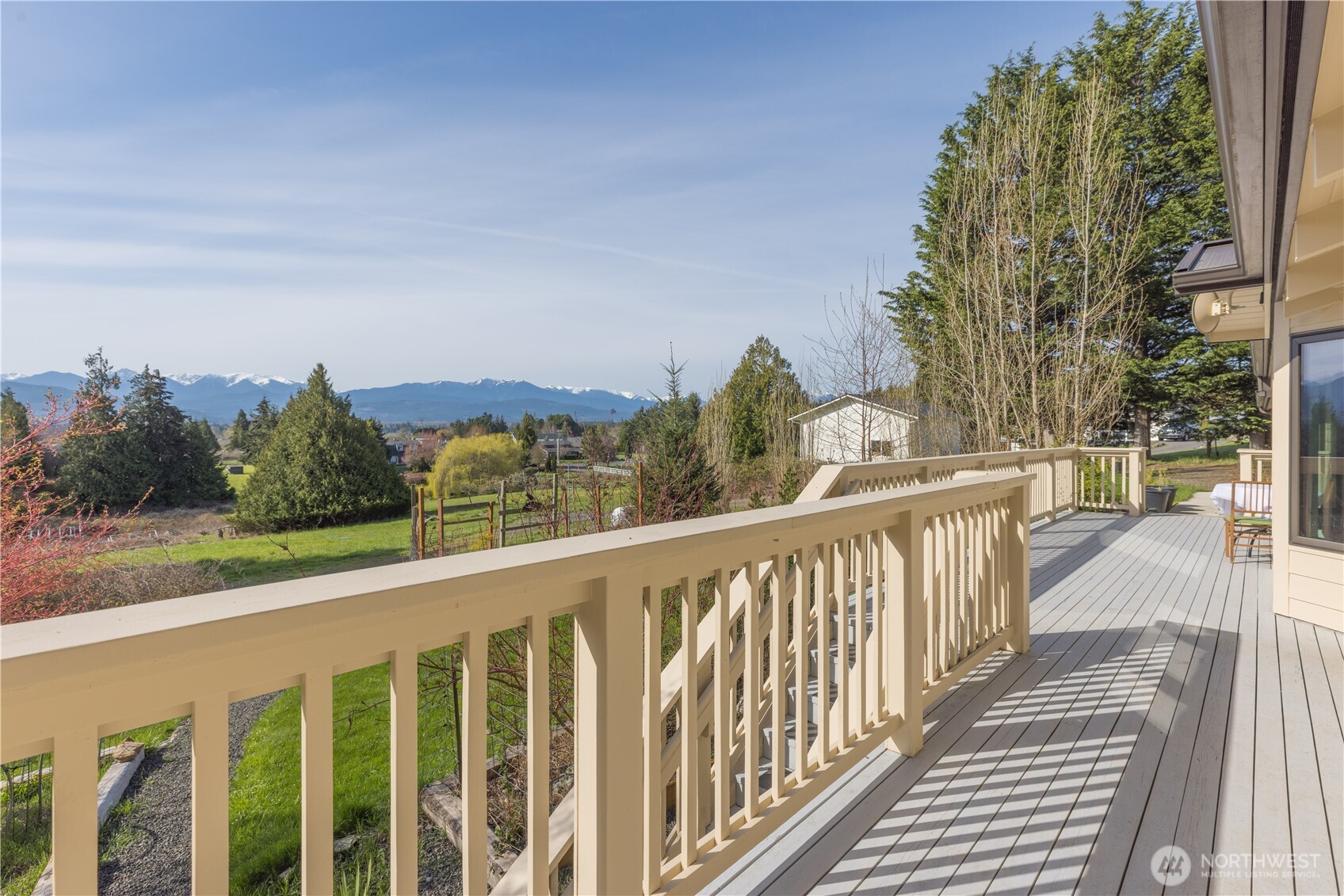 254 Simpson Road Sequim, WA 98382 - Photo 11 of 40 a view of a balcony with wooden floor and fence