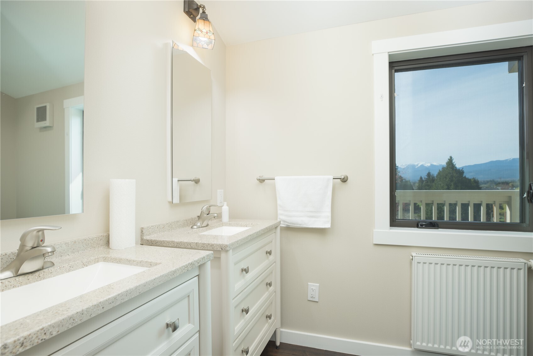 254 Simpson Road Sequim, WA 98382 - Photo 18 of 40 a bathroom with a sink and a mirror