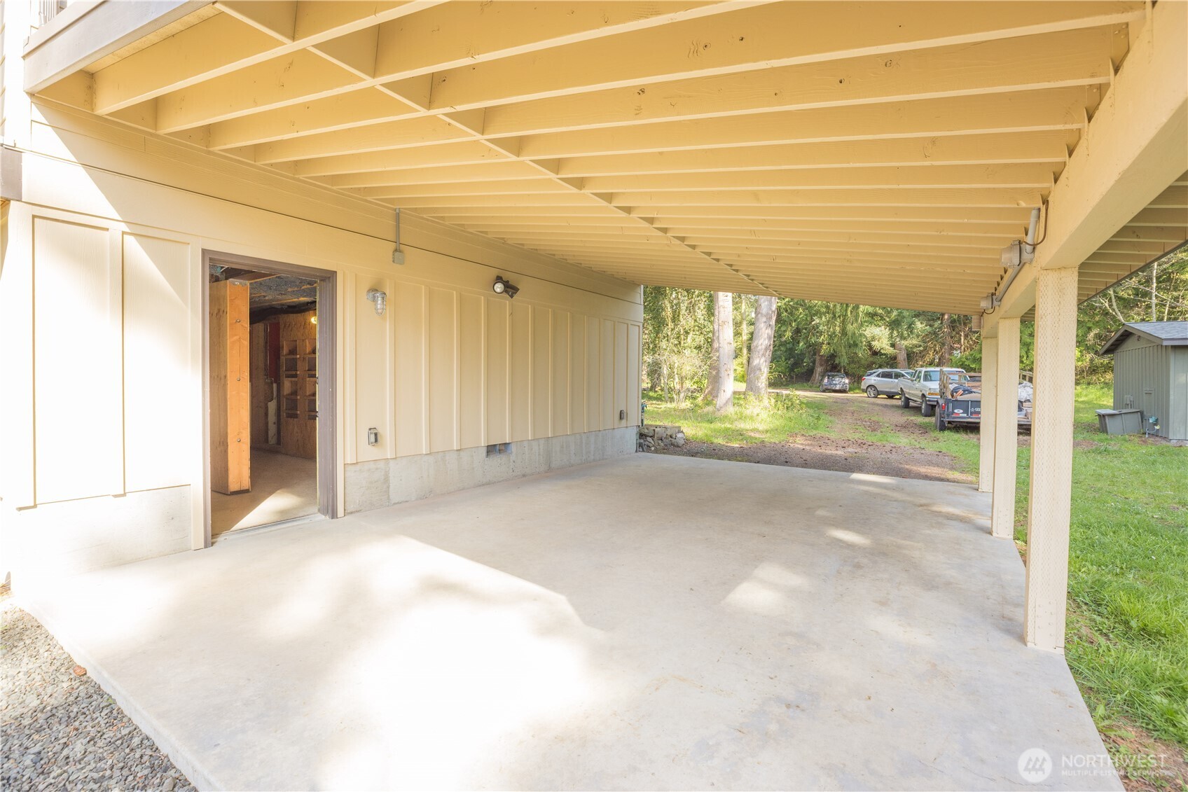 254 Simpson Road Sequim, WA 98382 - Photo 23 of 40 a view of a room with wooden floor and next to a window