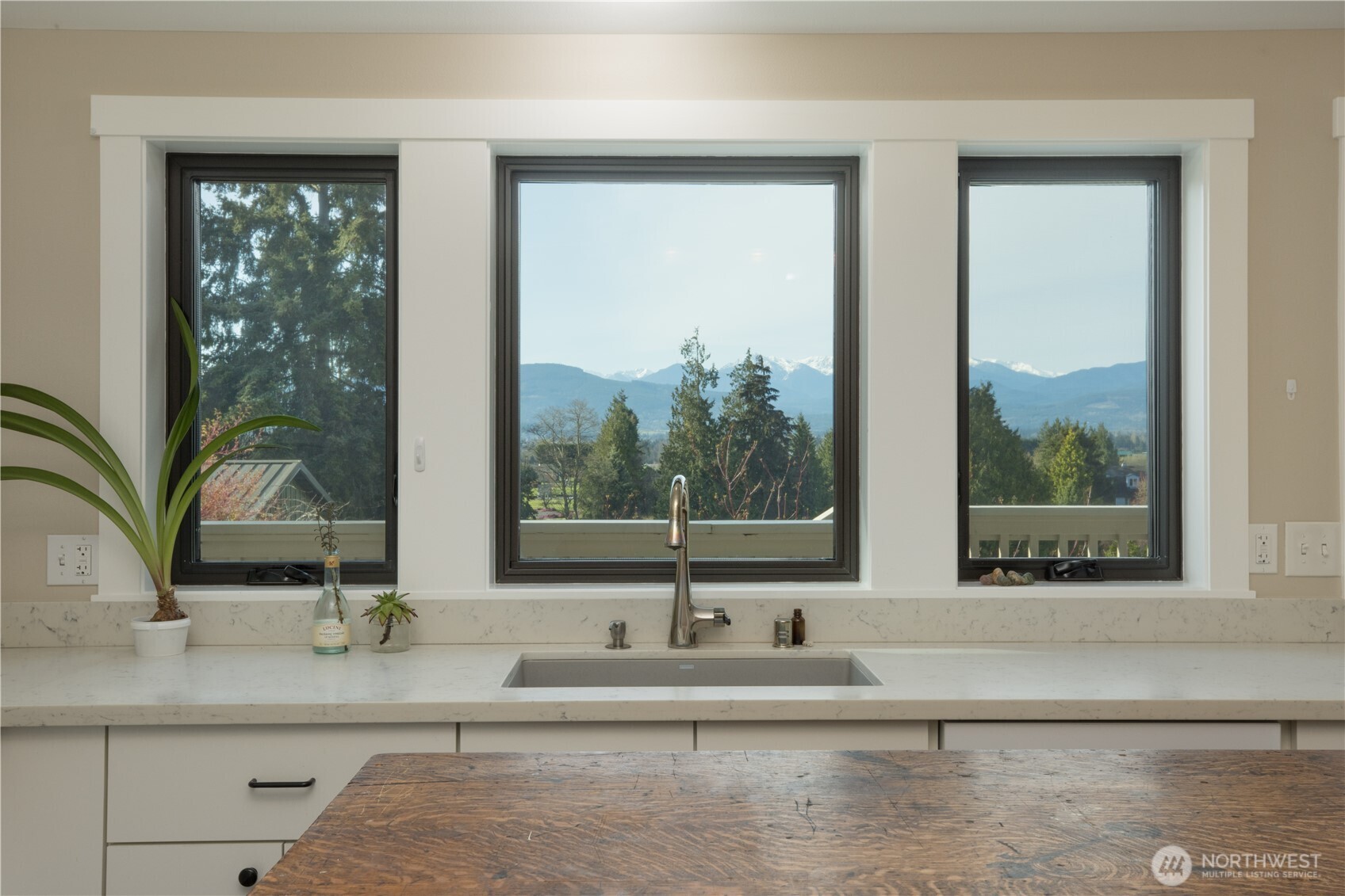 254 Simpson Road Sequim, WA 98382 - Photo 9 of 40 a view of a sink and a window