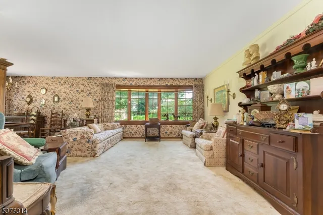 a view of a workspace with furniture