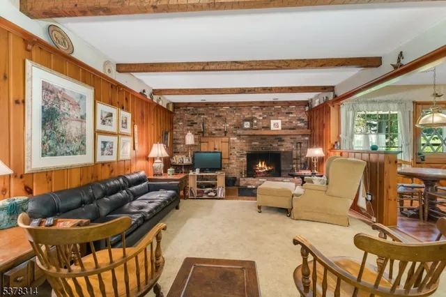 a bedroom with bed and a window