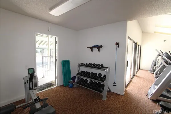 a room with furniture closet and a window