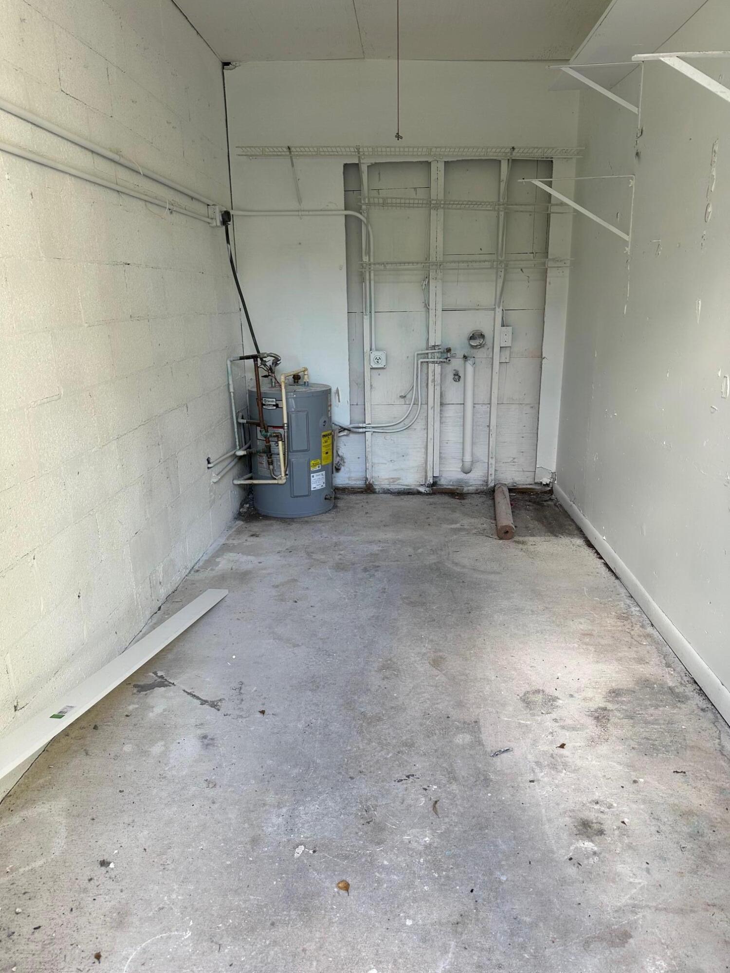 4810 Davis Road, Unit 4814 Lake Worth, FL 33461 - Photo 13 of 14 a view of a room with an empty space