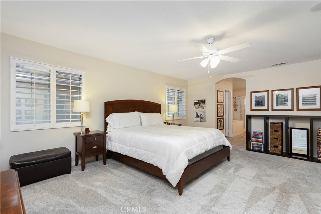 28 Rosenblum Irvine, CA 92602 - Photo 16 of 25 a bedroom with a bed couch and a window