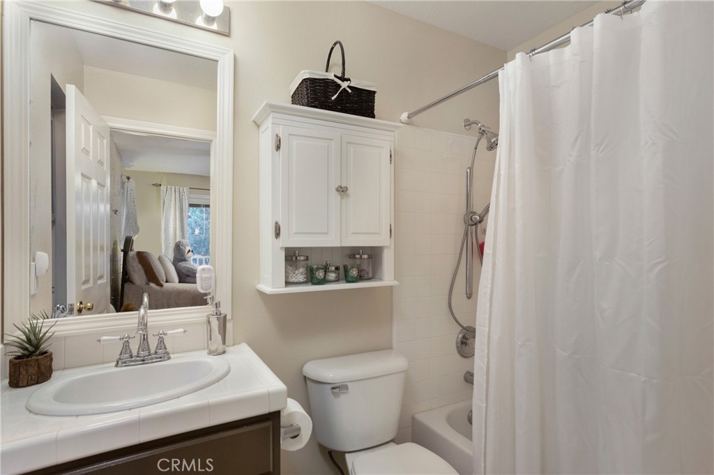 28 Rosenblum Irvine, CA 92602 - Photo 19 of 25 a bathroom with a sink toilet and shower