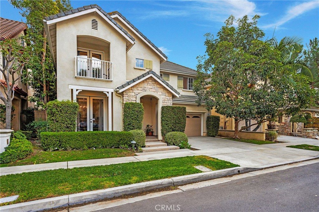 28 Rosenblum Irvine, CA 92602 - Photo 25 of 25 a front view of a house with a yard