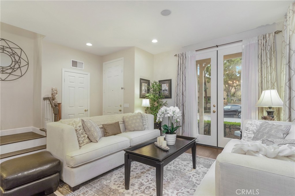 28 Rosenblum Irvine, CA 92602 - Photo 3 of 25 a living room with furniture and a large window
