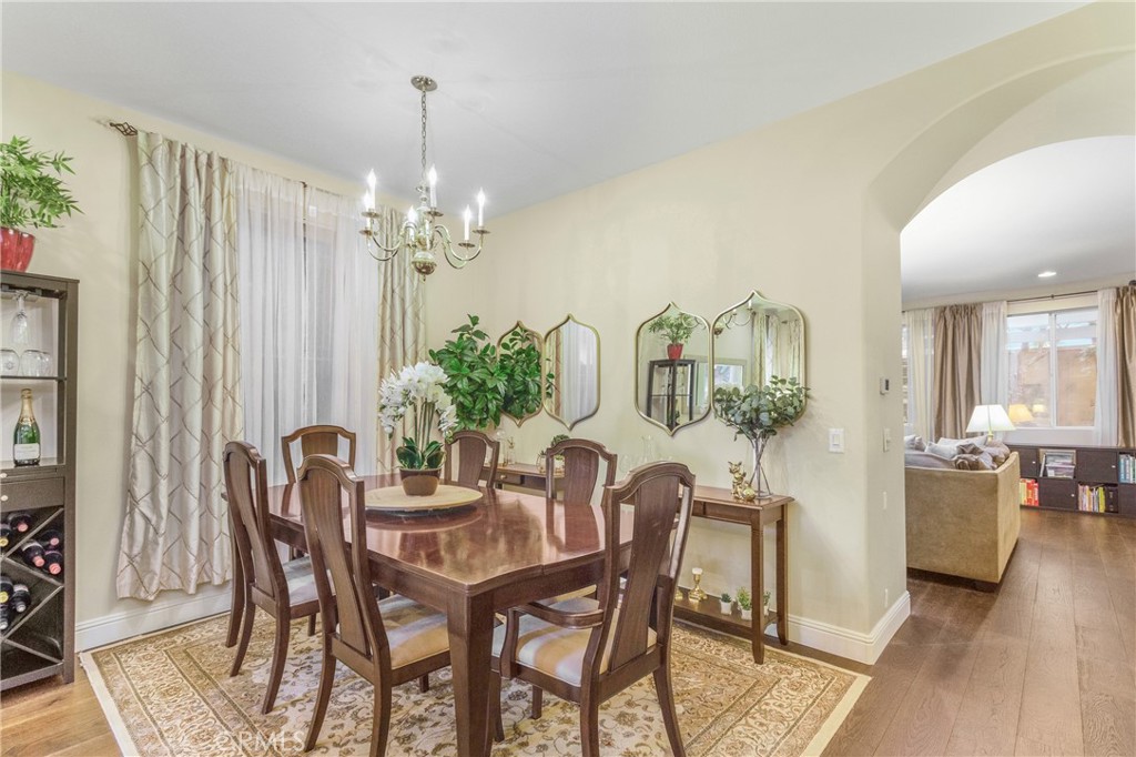 28 Rosenblum Irvine, CA 92602 - Photo 5 of 25 a view of a dining room with furniture and chandelier