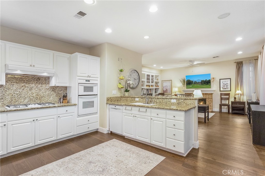 28 Rosenblum Irvine, CA 92602 - Photo 9 of 25 a kitchen with sink and cabinets