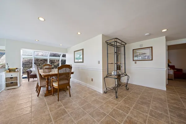 a view of a livingroom with furniture and window