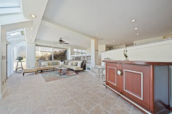 a living room with furniture and a table