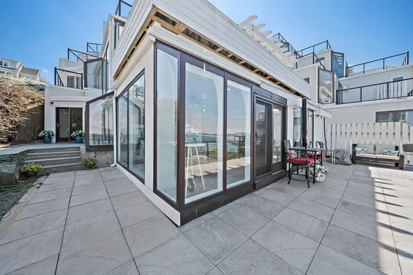 a view of a building with sitting area