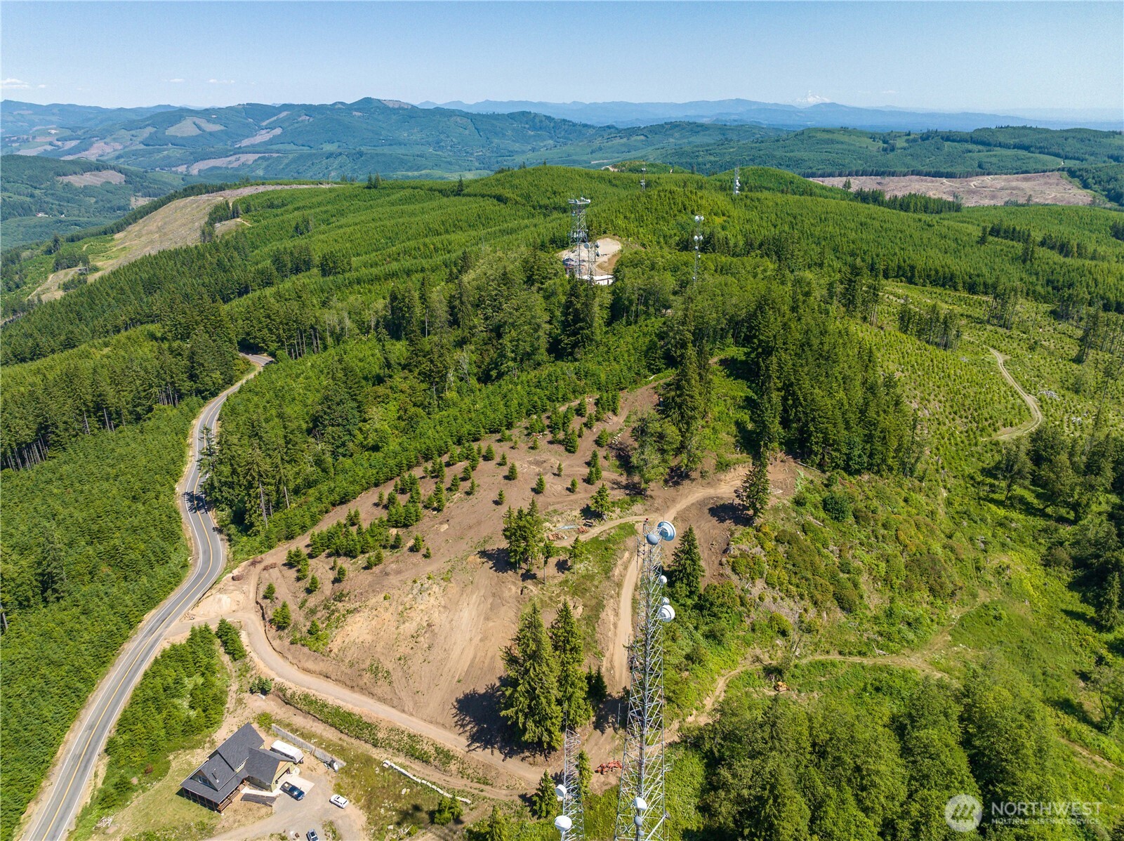 0 China Garden Road Kalama, WA 98625 - Photo 8 of 23 a view of a lush green forest with trees and houses