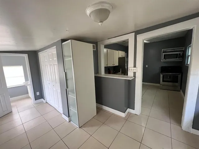 a view of a refrigerator in kitchen