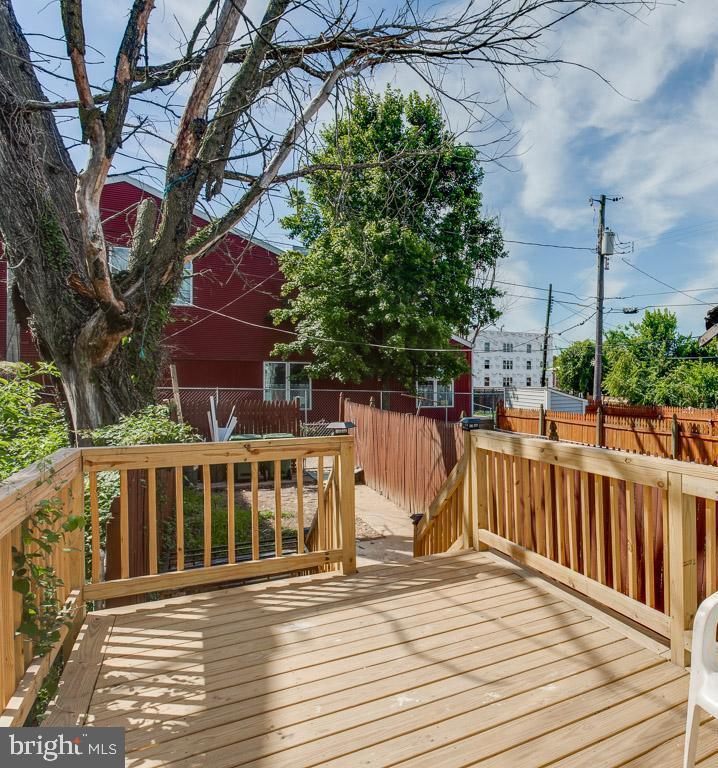 2625 West Cold Spring Lane Baltimore, MD 21215 - Photo 29 of 32 Backyard with 8 x 15-foot deck