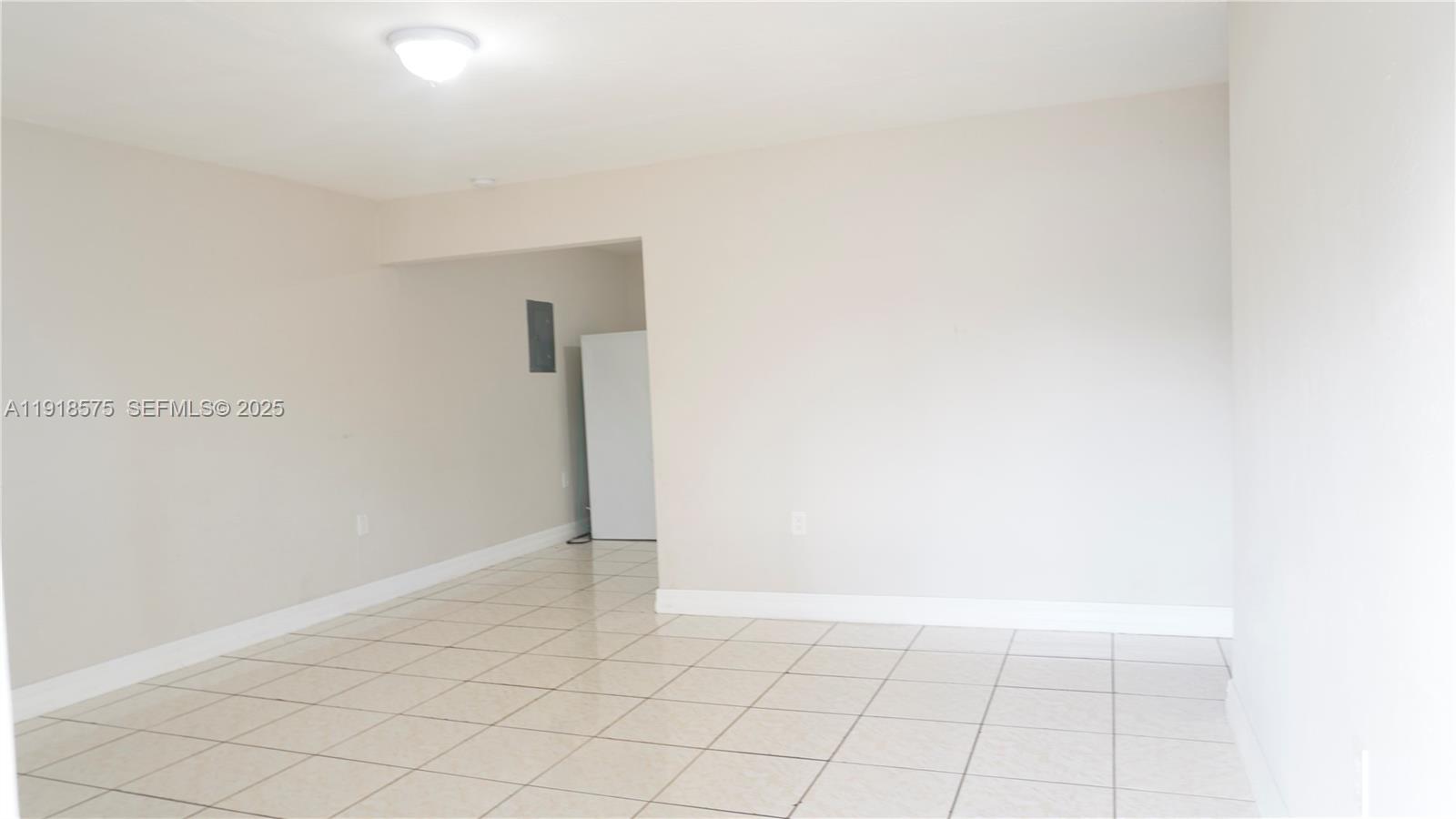 13701 Southwest 266th Street, Unit 13701 Homestead, FL 33032 - Photo 2 of 10 a view of an empty room